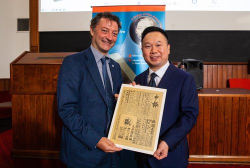 Presentation of a framed 1921 copy of Shen Bao